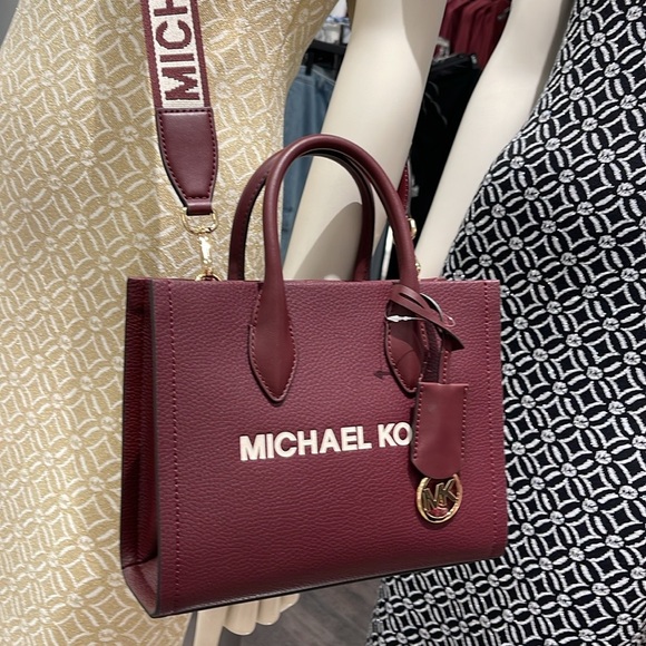 Michael Kors Mirella Small Pebbled Leather Crossbody Bag
Oxblood 
NWT - Picture 9 of 16